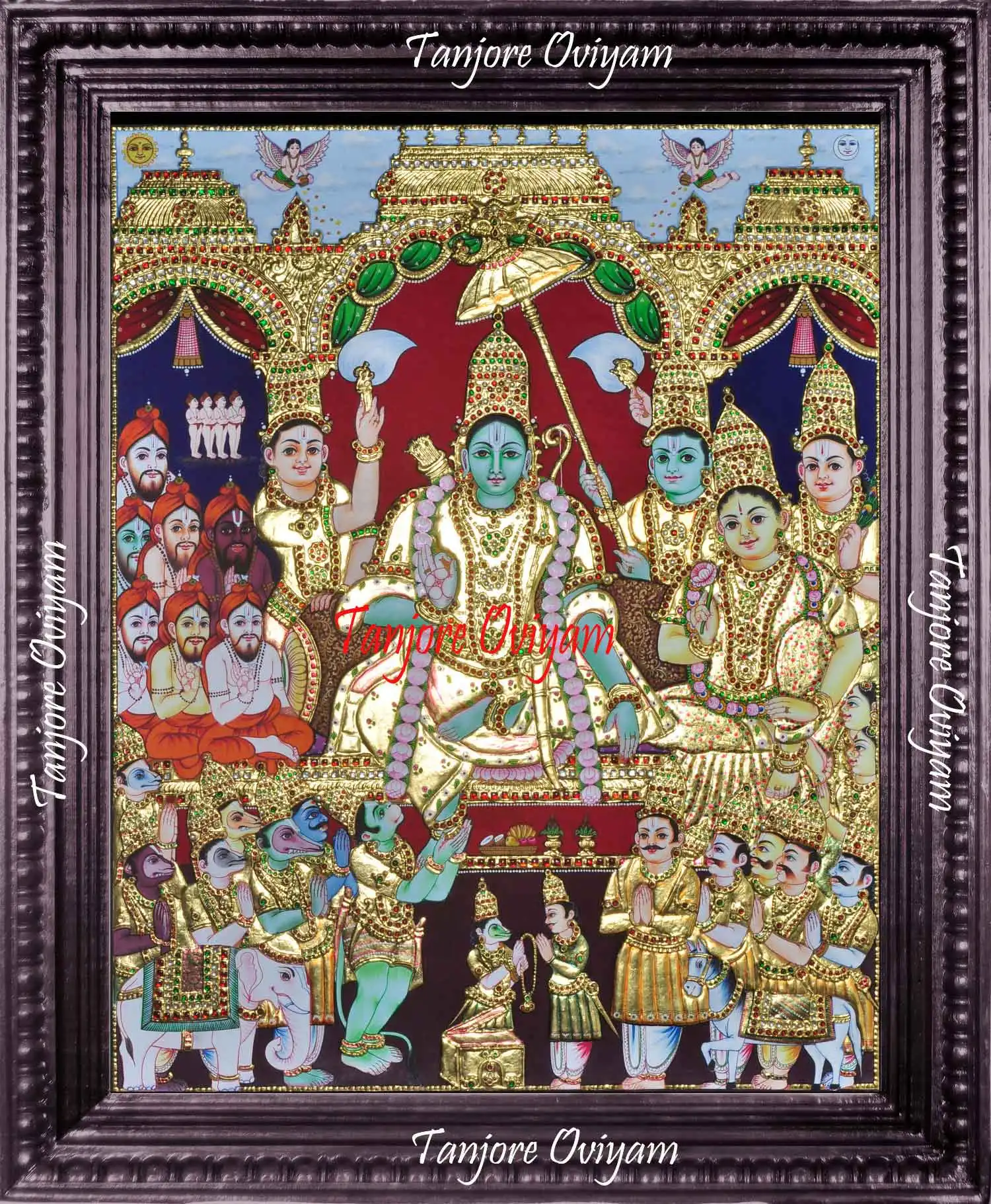 Ramar Pattabishegam Tanjore Painting depicting Lord Rama’s divine coronation with Sita, Lakshmana, Hanuman, and celestial figures in traditional gold foil detailing